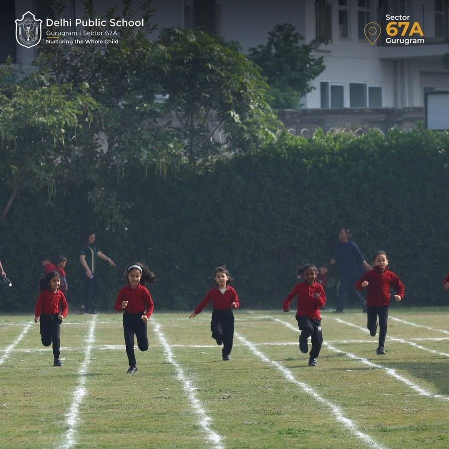 Little runners racing on the field during Sports Day